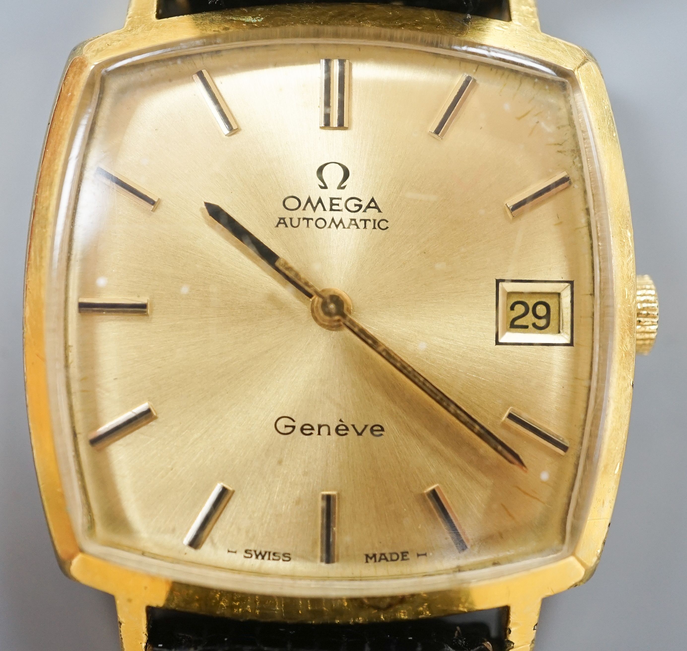 A gentleman's steel and gold plated Omega Automatic wrist watch, on associated leather strap, case diameter 32mm, with box, guarantee and spare strap.